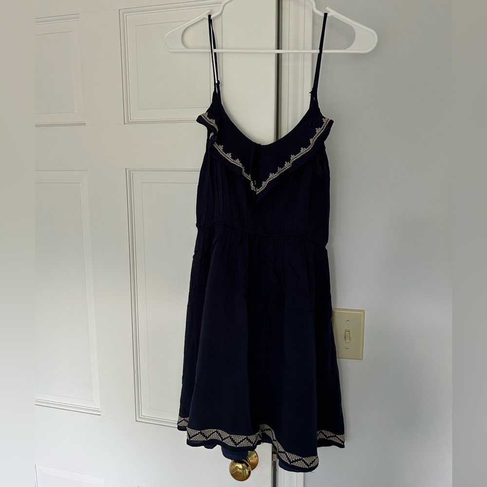 Navy Womens sundress with tan embroidered trim. Super b brand, Size Large.